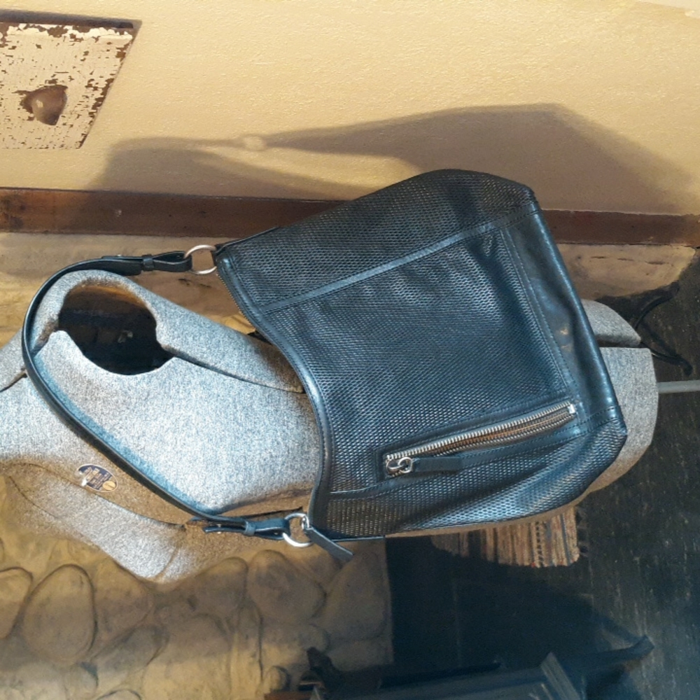 Frye LENA PERF HOBO leather bag in black.